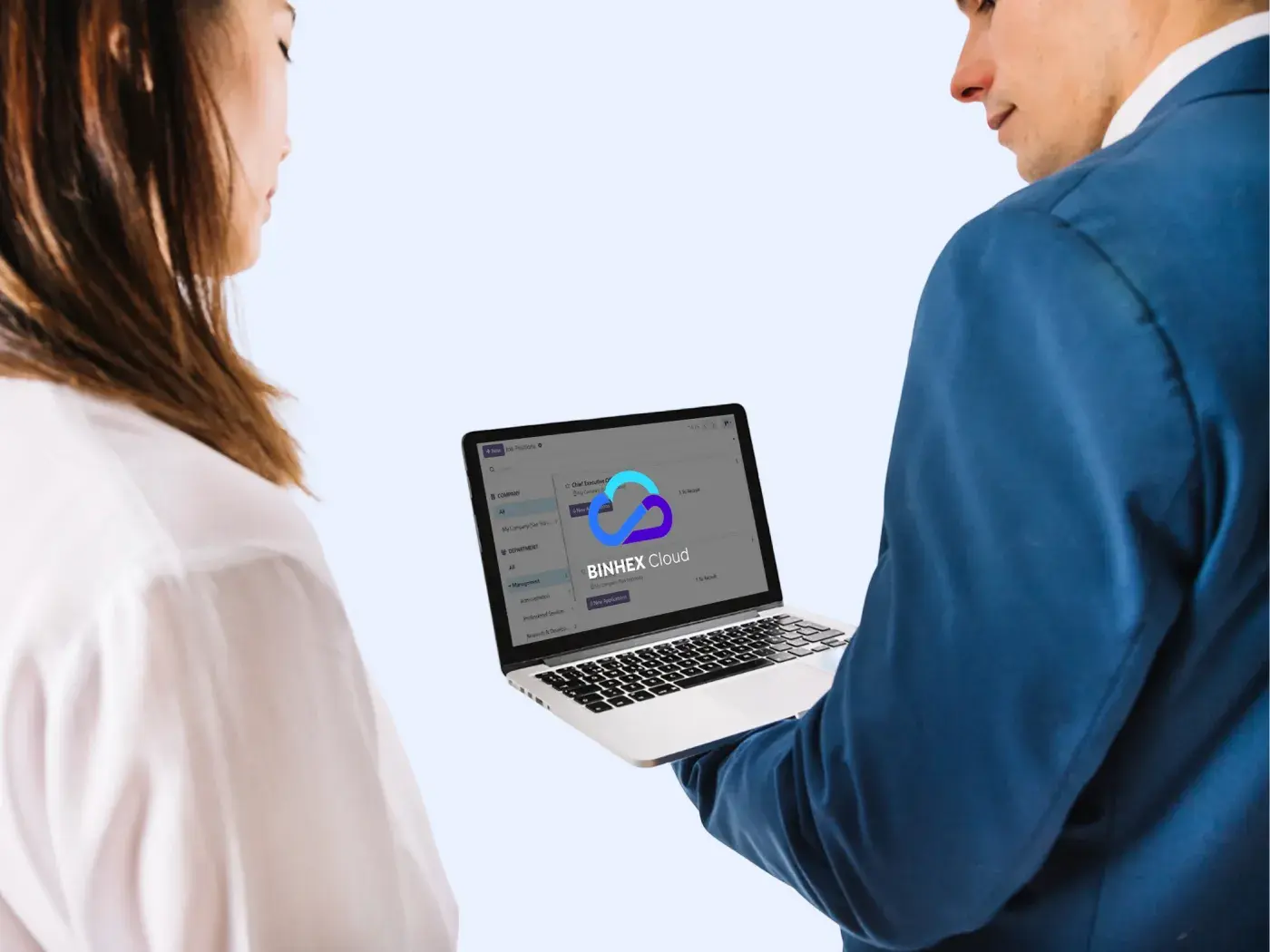 Two people looking at the Binhex Cloud system on a computer